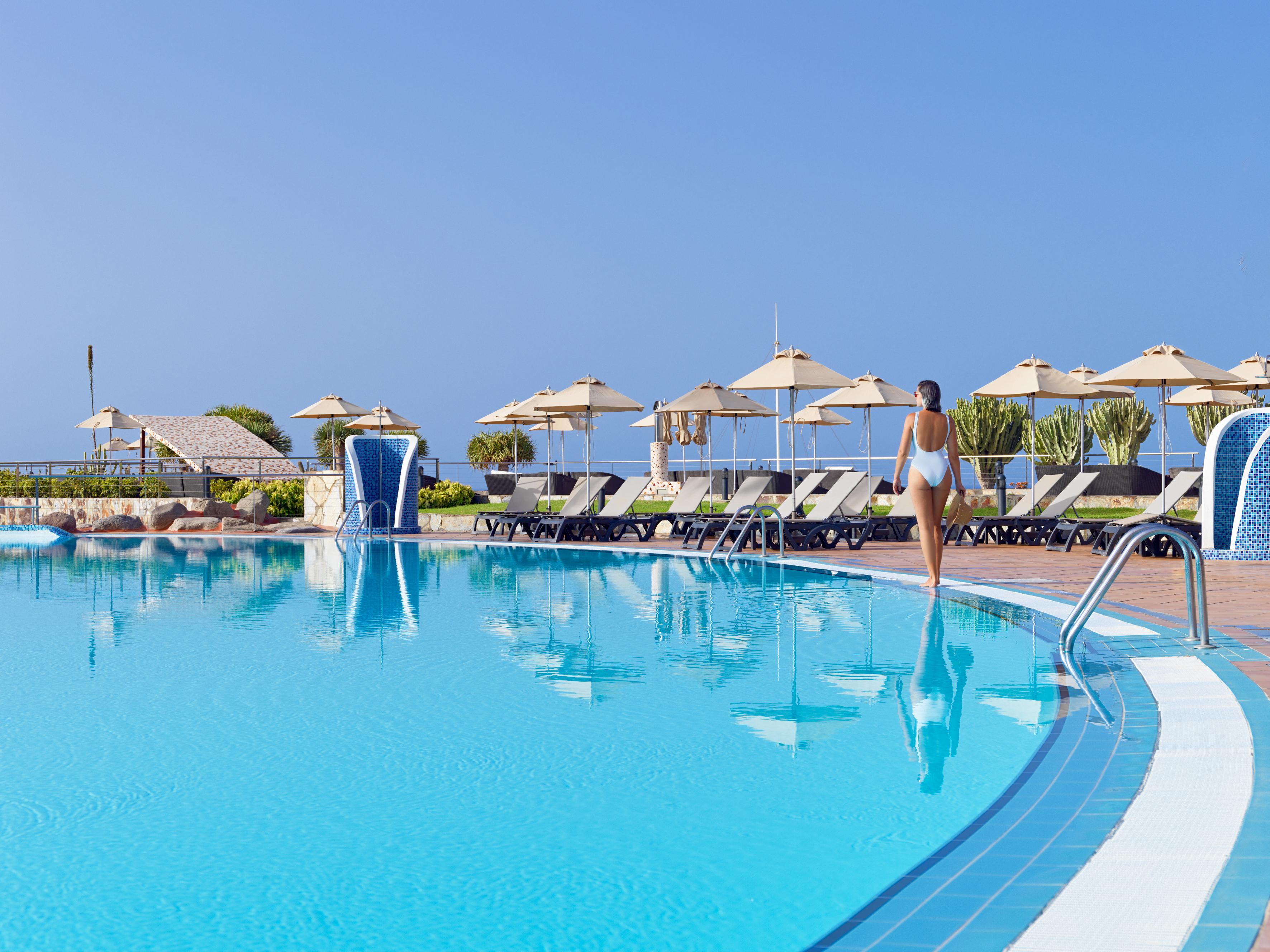 Hotel H10 Playa Meloneras Horizons Collection Esterno foto A swimming pool at a hotel