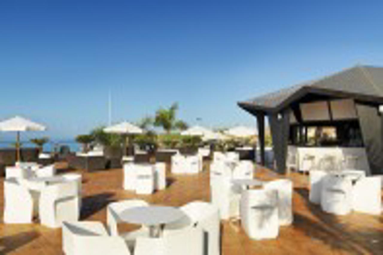 Hotel H10 Playa Meloneras Horizons Collection Esterno foto The beach bar at the hotel